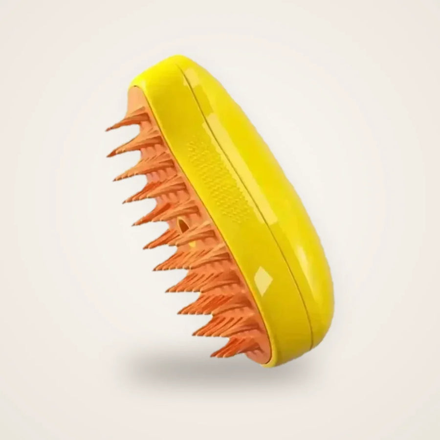 Brosse vapeur pour chat jaune sur fond neutre