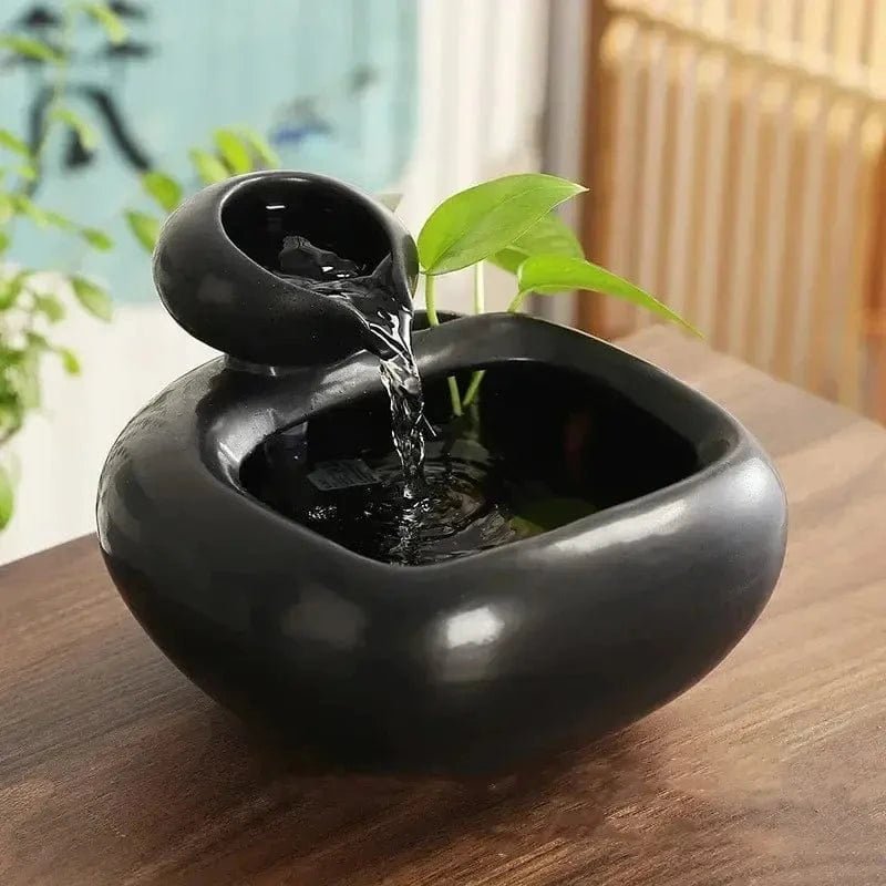 Fontaine à eau chat céramique sans filtre ClayFlow noire avec jet d'eau et plante